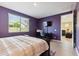 Bedroom with a view of the living room and backyard at 24884 N 171St Ln, Surprise, AZ 85387