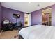 Bedroom with a work space, and view into the living area at 24884 N 171St Ln, Surprise, AZ 85387