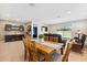 Dining area with wood table and access to backyard at 24884 N 171St Ln, Surprise, AZ 85387