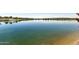 Serene lake view with a peaceful atmosphere at 24884 N 171St Ln, Surprise, AZ 85387