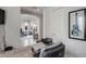 Home office with built-in desk and view into living room at 2340 W Horsetail Trl, Phoenix, AZ 85085