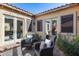 Charming courtyard with seating area and access to the home at 2340 W Horsetail Trl, Phoenix, AZ 85085