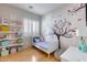 bedroom with a twin bed and whimsical wall decor at 2340 W Horsetail Trl, Phoenix, AZ 85085