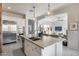 Open kitchen with island, stainless steel appliances, and views to Gathering room at 2340 W Horsetail Trl, Phoenix, AZ 85085