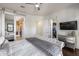Spacious Primary bedroom with large bed, walk-in closet, and ensuite bathroom at 2340 W Horsetail Trl, Phoenix, AZ 85085
