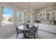 Charming breakfast nook with round table and window views at 2340 W Horsetail Trl, Phoenix, AZ 85085