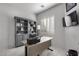 Home office with built-in desk and shelving at 2340 W Horsetail Trl, Phoenix, AZ 85085