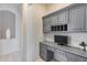 Home office with built-in desk and cabinets at 2340 W Horsetail Trl, Phoenix, AZ 85085