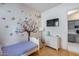Small bedroom with twin bed and built-in shelving at 2340 W Horsetail Trl, Phoenix, AZ 85085