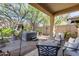 Relaxing patio with hot tub and seating area at 2340 W Horsetail Trl, Phoenix, AZ 85085