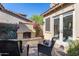 Cozy courtyard with fireplace and seating area at 2340 W Horsetail Trl, Phoenix, AZ 85085