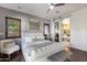 Luxurious Primary suite with plush bed and ensuite bathroom at 2340 W Horsetail Trl, Phoenix, AZ 85085