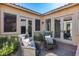 Relaxing courtyard with comfortable seating and access to the interior at 2340 W Horsetail Trl, Phoenix, AZ 85085