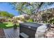 Landscaped backyard with hot tub and grass area at 2340 W Horsetail Trl, Phoenix, AZ 85085