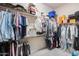 Large walk-in closet with ample hanging space and shelving at 2340 W Horsetail Trl, Phoenix, AZ 85085