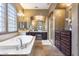 Spa-like bathroom with soaking tub, double vanity, and a walk-in shower at 2340 W Horsetail Trl, Phoenix, AZ 85085