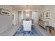 Formal dining room featuring a statement chandelier and a view to the kitchen at 2340 W Horsetail Trl, Phoenix, AZ 85085
