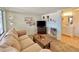 Living room with a view into the bathroom and TV at 8865 E Baseline Rd # 504, Mesa, AZ 85209