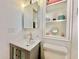 Stylish bathroom featuring a modern vanity and storage at 8865 E Baseline Rd # 504, Mesa, AZ 85209