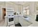 Updated kitchen with stainless steel appliances and modern finishes at 8865 E Baseline Rd # 504, Mesa, AZ 85209