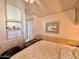 Bedroom with built-in shelving and an ensuite bathroom at 8865 E Baseline Rd # 504, Mesa, AZ 85209