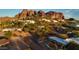 Aerial view of homes nestled into a mountainside community at 4549 E Marion Way, Phoenix, AZ 85018