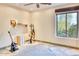 Home office or music room with natural light and tile floor at 4549 E Marion Way, Phoenix, AZ 85018