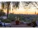 Stunning sunset view of city skyline from the backyard patio at 4549 E Marion Way, Phoenix, AZ 85018