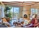 Spacious living room with fireplace and large windows offering scenic views at 4549 E Marion Way, Phoenix, AZ 85018