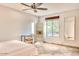 Bright bedroom with tile floors and built-in shelving at 4549 E Marion Way, Phoenix, AZ 85018