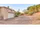 Attached garage with basketball hoop and ample driveway space at 4549 E Marion Way, Phoenix, AZ 85018