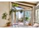 Bedroom with sliding glass doors leading to a private patio at 4549 E Marion Way, Phoenix, AZ 85018