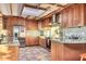 Modern kitchen with granite counters and wood cabinets at 4549 E Marion Way, Phoenix, AZ 85018