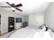 Bedroom with two twin beds, ceiling fan, and plenty of natural light at 3413 N 16Th N Dr, Phoenix, AZ 85015