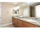 Double vanity bathroom with granite countertops at 3413 N 16Th N Dr, Phoenix, AZ 85015