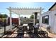 Relaxing patio with pergola, fire pit, and seating at 3413 N 16Th N Dr, Phoenix, AZ 85015