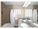 Double vanity bathroom with granite countertops and tiled shower/tub at 3413 N 16Th N Dr, Phoenix, AZ 85015