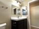 Bathroom with vanity, mirror and a toilet at 414 E 5Th St, Eloy, AZ 85131