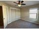 Bedroom with double door closet and window at 414 E 5Th St, Eloy, AZ 85131