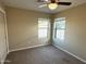 Well-lit bedroom with ceiling fan and window at 414 E 5Th St, Eloy, AZ 85131