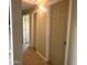 Bright hallway with doors to bedrooms and bath at 414 E 5Th St, Eloy, AZ 85131