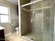 Bathroom with large tiled shower and updated vanity at 414 E 5Th St, Eloy, AZ 85131