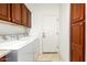 Convenient laundry room with washer, dryer, and storage at 2625 W Via Vis, Phoenix, AZ 85086