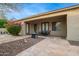 Covered patio, stone flooring, and a dining table with chairs at 2625 W Via Vis, Phoenix, AZ 85086