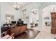 Home office with hardwood floors and views into the entryway at 8446 E Laurel St, Mesa, AZ 85207