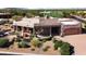 Exterior view of the home, showcasing its stucco finish and landscaping at 18305 E Adobe Way, Rio Verde, AZ 85263