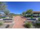 Outdoor bocce ball court with benches and shade structures at 22706 N 184Th Ave, Surprise, AZ 85387