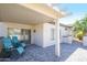 Covered patio with pavers and seating area, perfect for relaxing at 18320 N Las Rocas Way, Surprise, AZ 85374