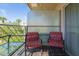 Relaxing balcony with two chairs and a small table at 2201 N Central Ave # 4E, Phoenix, AZ 85004