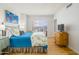 Bright bedroom with comfortable bed and ample closet space at 2201 N Central Ave # 4E, Phoenix, AZ 85004